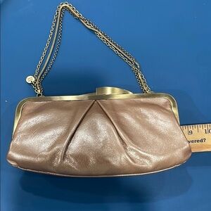 Hobo HALEY NWT Beautiful clutch   rose gold tone measurement are in photos.